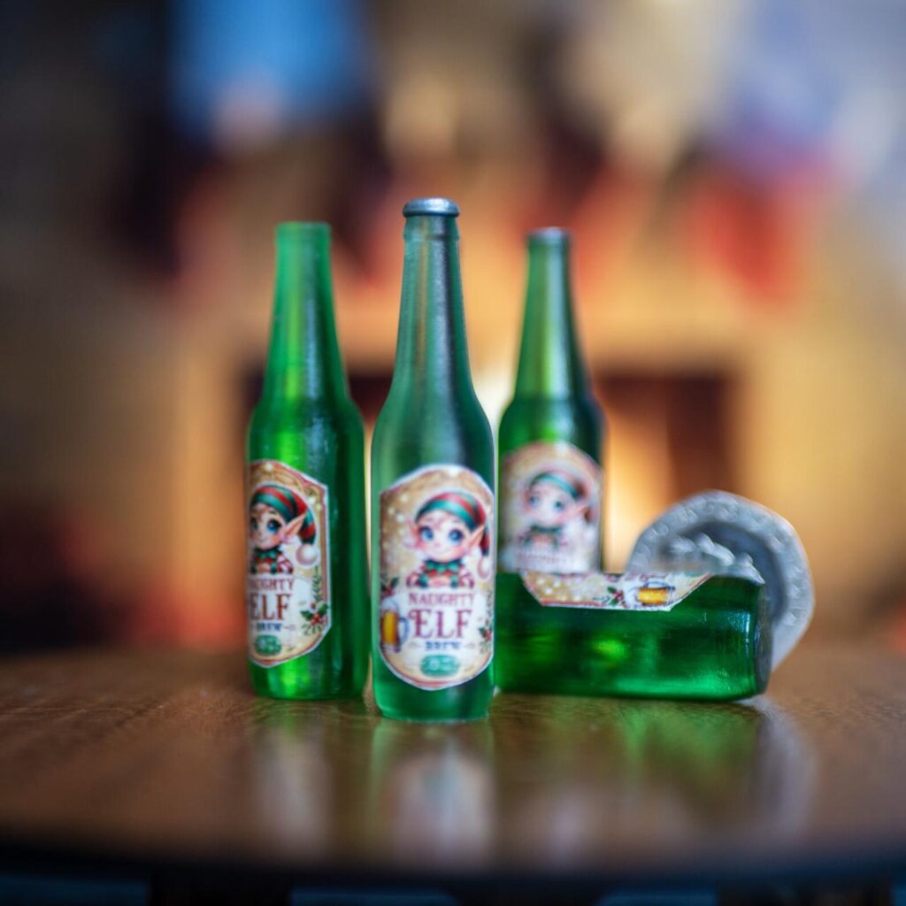 Naughty Elf Brew bottles, one lying on its side
