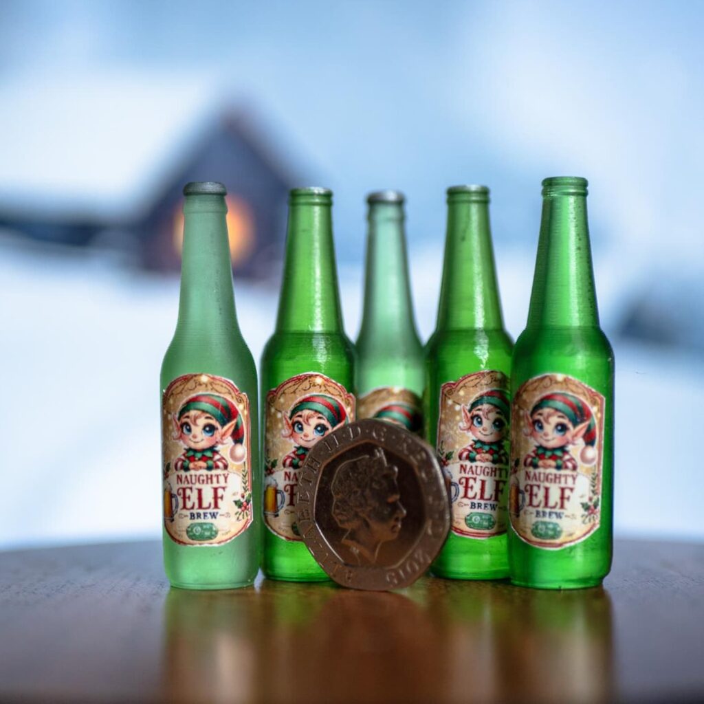 Five Naughty Elf Brew bottles against a snowy background