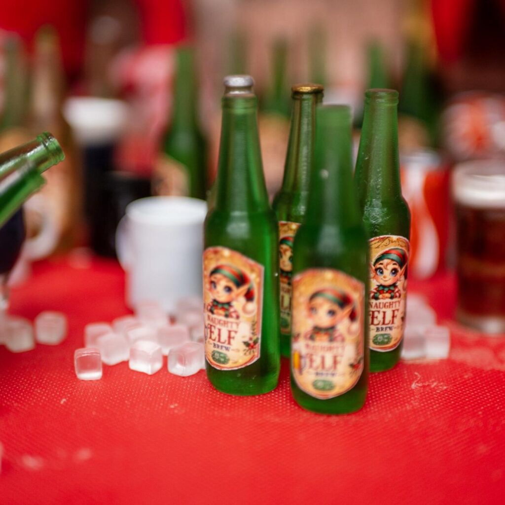 Naughty Elf Brew bottles on a red tablecloth